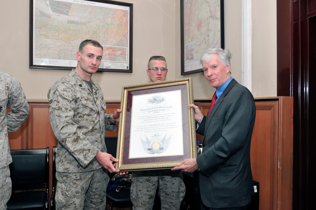 U.S. Ambassador to Afghanistan Ryan Crocker expresses his appreciation after receiving the Honorary Marine title at the International Security Assistance Force Headquarters, July 22. Crocker received the Honorary Marine title in recognition of his service with and alongside Marines throughout his 41-year career as a U.S. foreign service officer. ISAF and United States Forces – Afghanistan Commander Gen. John R. Allen presided over the ceremony where members of the U.S. Embassy in Kabul Marine Security Detachment, who nominated the outgoing ambassador for the title, presented his Honorary Marine certificate and pinned him with an Eagle, Globe and Anchor. Approved only by the Commandant of the Marine Corps, the honor recognizes individuals in the civilian community who have made extraordinary contributions to the Corps. Crocker is the 75th person to receive the title.